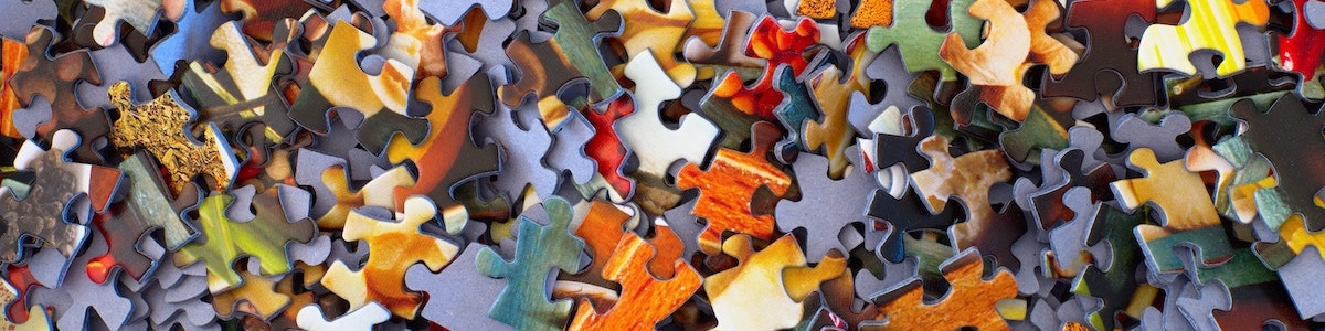 color photo of piled puzzle pieces