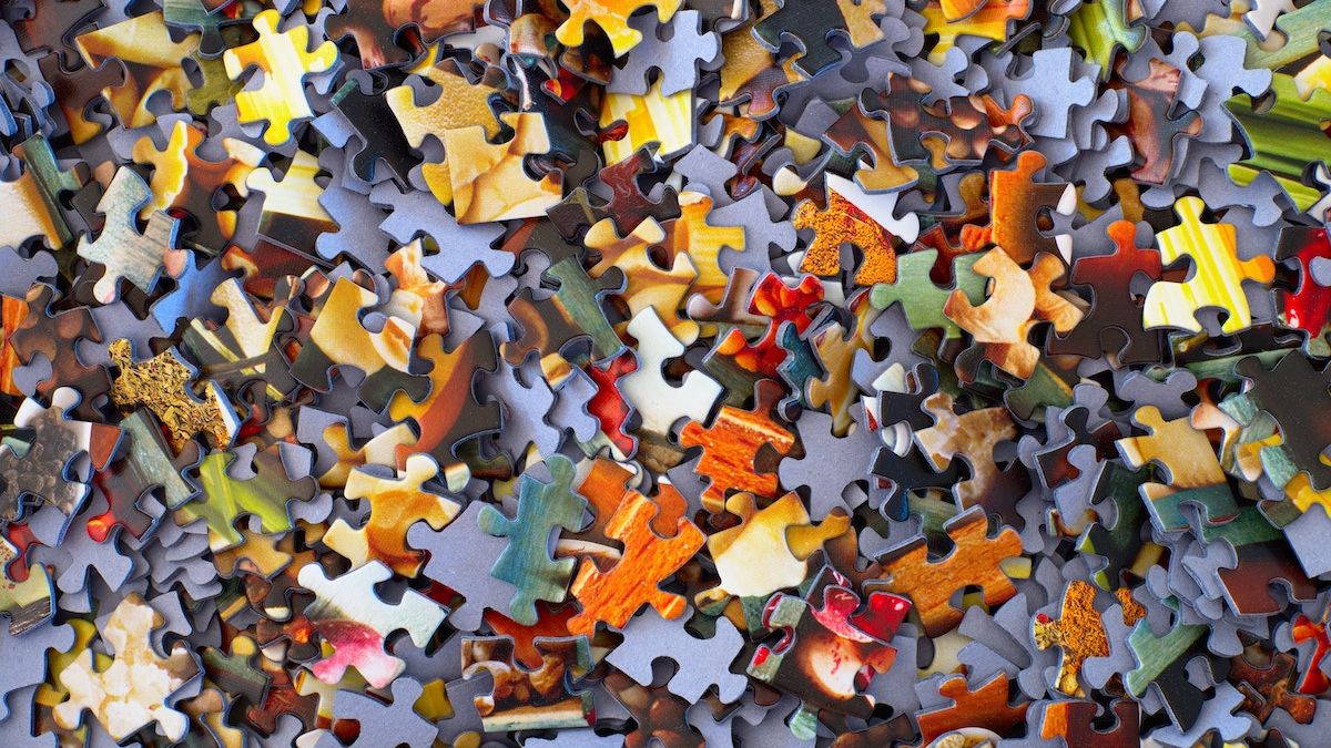 Color photo of a pile of puzzle pieces